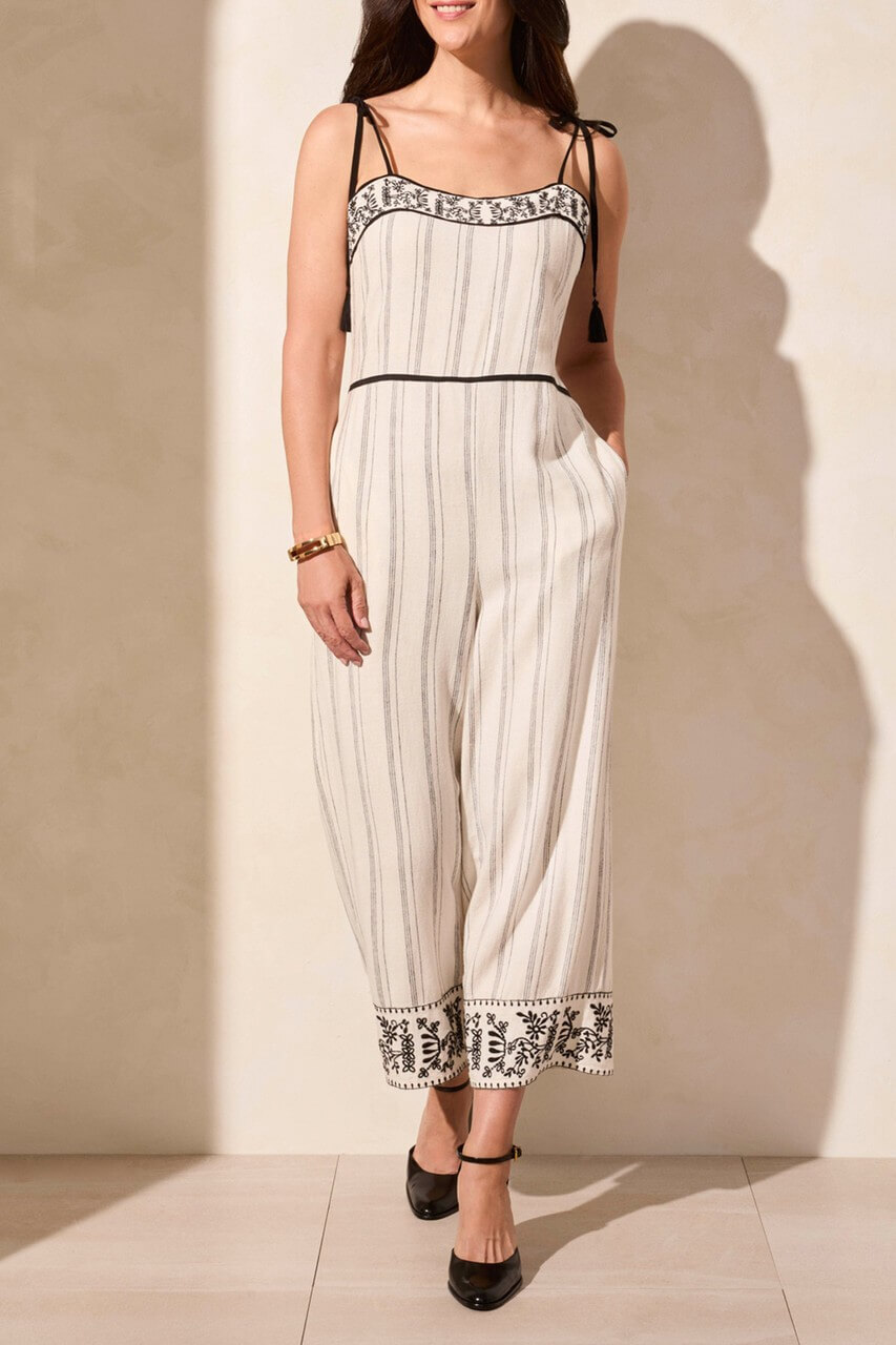woman in embroidered stripe jumpsuit