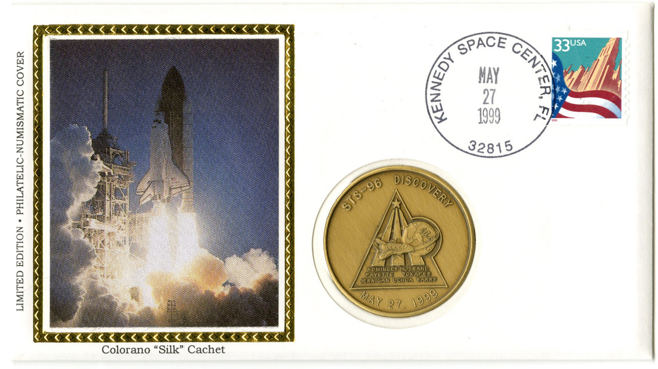 STS96M - STS-96. Launch cover with official medal