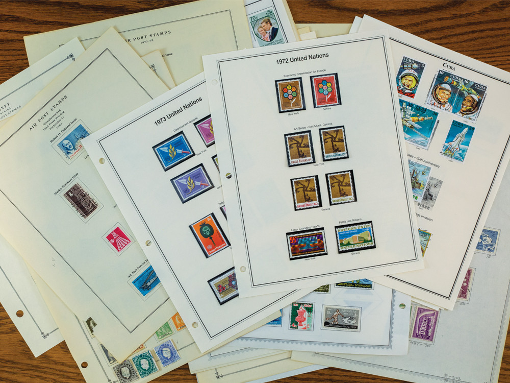 MXM001 - 1/2 Pound Worldwide Album Pages, includes Unused and Used Stamps