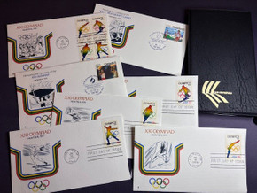 52021 - 1976 Olympic Set of 7 First Day and Commemorative Covers plus Mini Album
