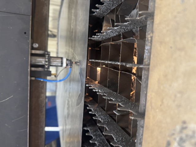 Metal Worx laser cutting steel in the Fayetteville shop