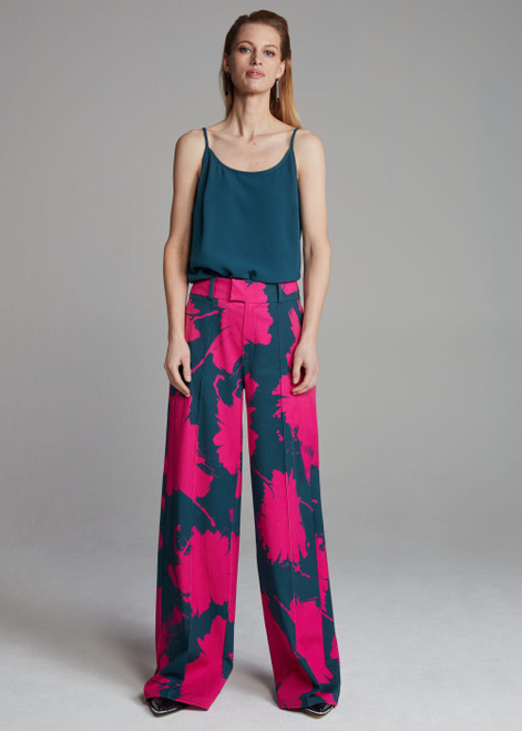 POM Blue top with adjustable straps, dragonfly brooch, and loose fit. Made of 100% recycled polyester.