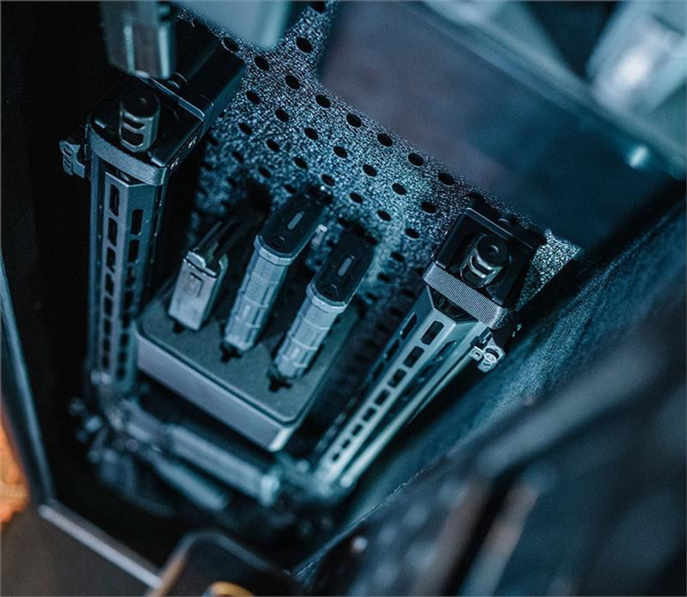 Interior of Vaultek NRS200i-BK ViSN Smart Safe showing storage for two rifles, handguns, and modular pegboard system.