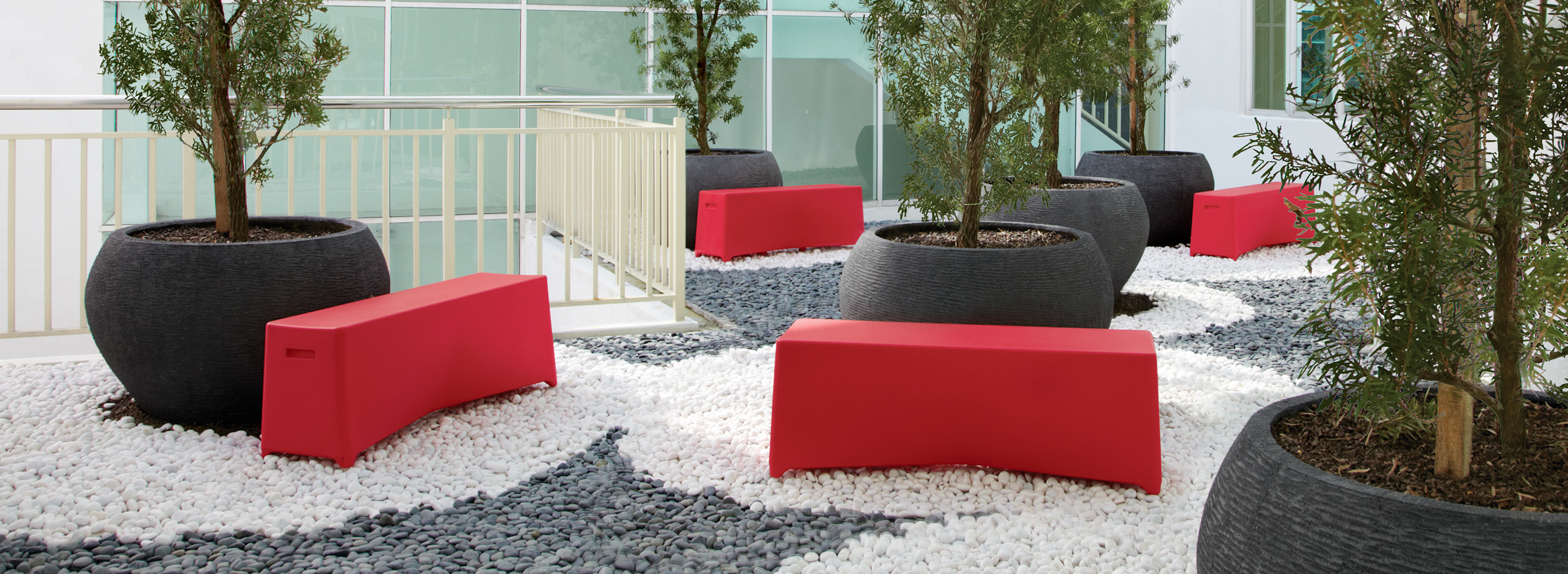 The Rumi Collection of outdoor benches and stools by Kannoa