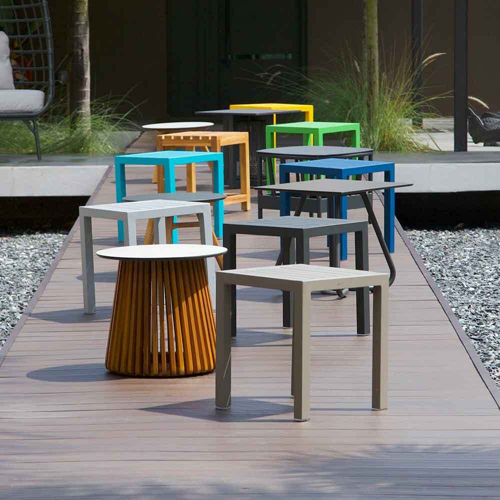 SIDE TABLES AND OTTOMANS Outdoor side tables, coffee tables, consoles and ottomans designed for Commercial, Hospitality and Residential Settings