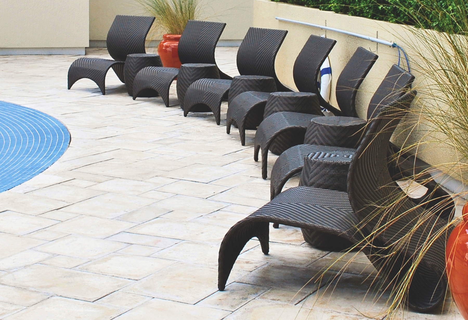 Modern Wicker Outdoor Maui Chair and Ottoman designed for Commercial, Hospitality and Residential Settings