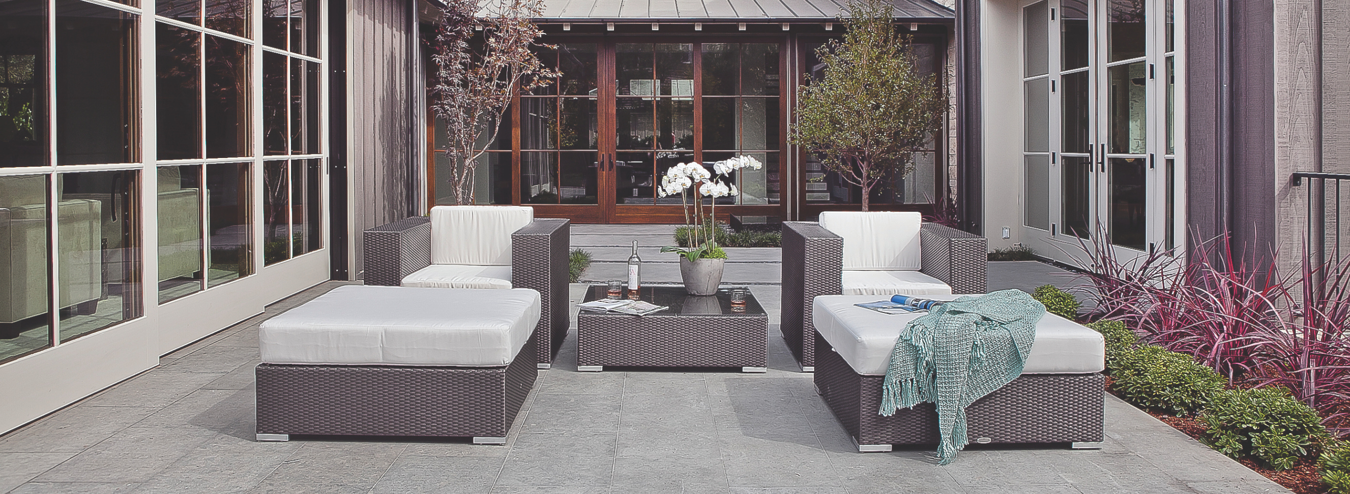 The Tangier collection combines versatility, modern sophistication, and customizable design to elevate any outdoor setting with its sleek sectional pieces, wide arms, and aluminum feet.
