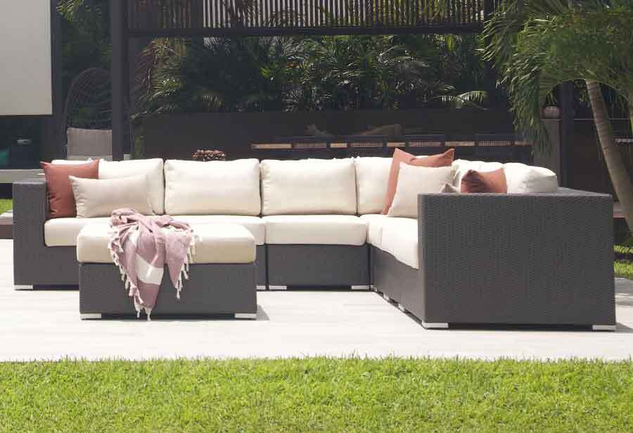 The Tangier collection combines versatility, modern sophistication, and customizable design to elevate any outdoor setting with its sleek sectional pieces, wide arms, and aluminum feet.
