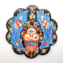 Fair trade hand painted relief style ceramic trivet from Turkey