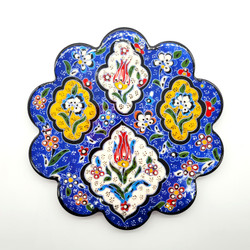 Fair trade hand painted relief style ceramic trivet from Turkey