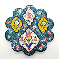 Fair trade hand painted relief style ceramic trivet from Turkey
