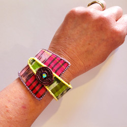 Fair trade corte cotton huipil fabric and beaded triangle bracelet from Guatemala
