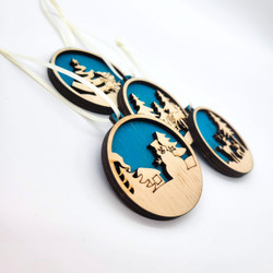 Fair trade laser cut and brush painted wood sleigh, snowman, and reindeer Christmas ornament set from Chile