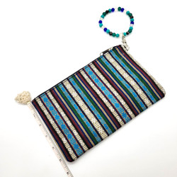 Fair trade Tibetan fabric clutch purse with stretch wristlet from Nepal