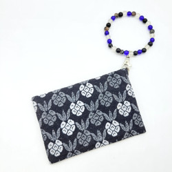 Fair trade black and white Dhaka cotton fabric coin purse wristlet from Nepal