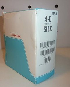 Nonabsorbable Suture with Needle Perma-Hand Silk RB-1 1/2 Circle Taper Point Needle Size 4 - 0 Braided K871H Box of 36