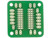 Green Protoboard with 20 Pin DIP Breakout, gold-plated pads and holes, square shape, white background.