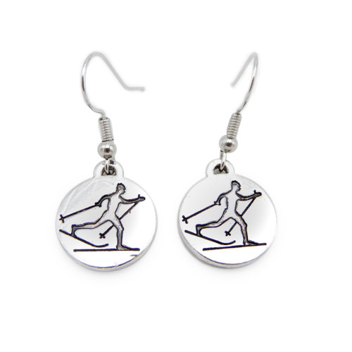 Pair of silver earrings with embossed cross country skiers from LILO Collections