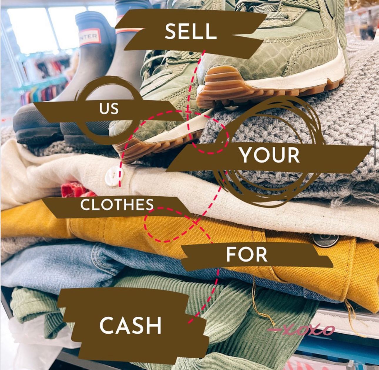 A pile of clothes and shoes on top of a counter.