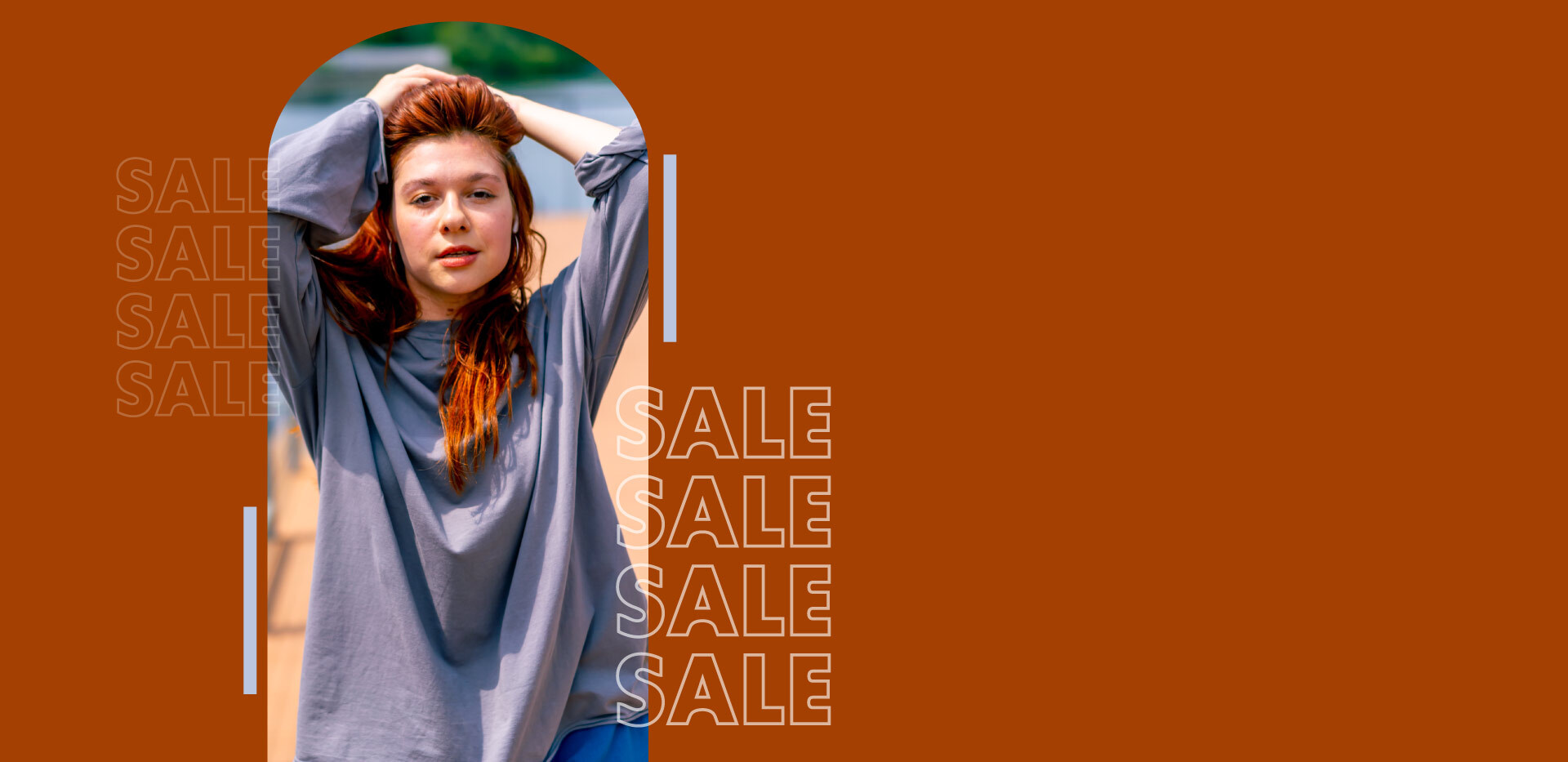 Girl posing with the word SALE around her