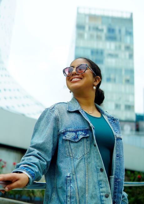 Girl in city wearing sunglasses