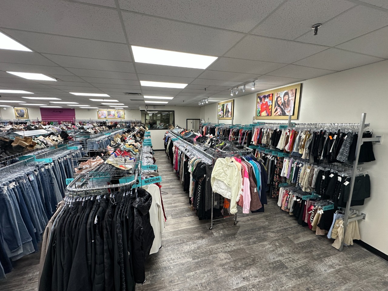 Plato's Closet London south store photo, wide angle showing the women's clothing section..