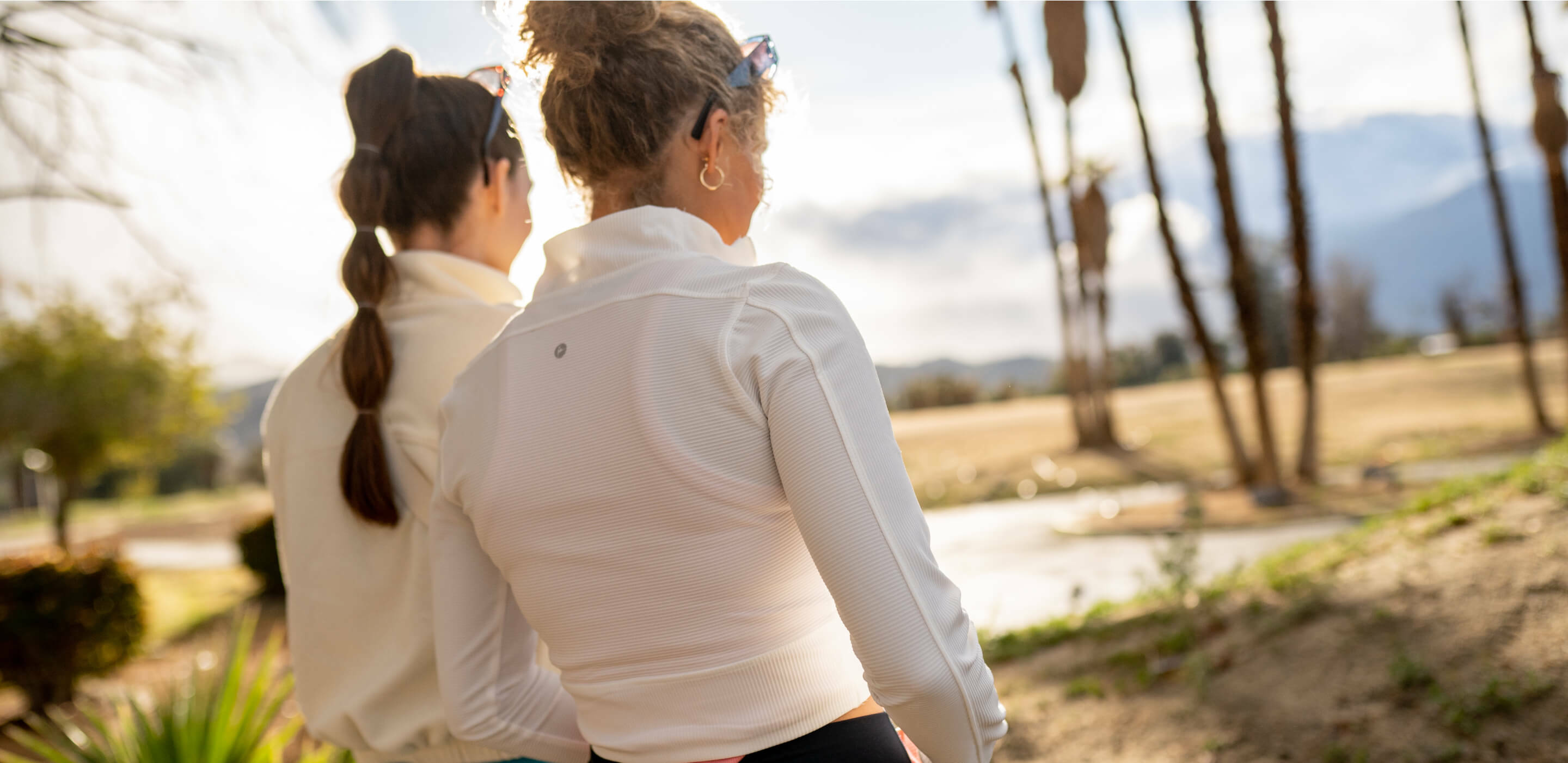 2 women walking outside