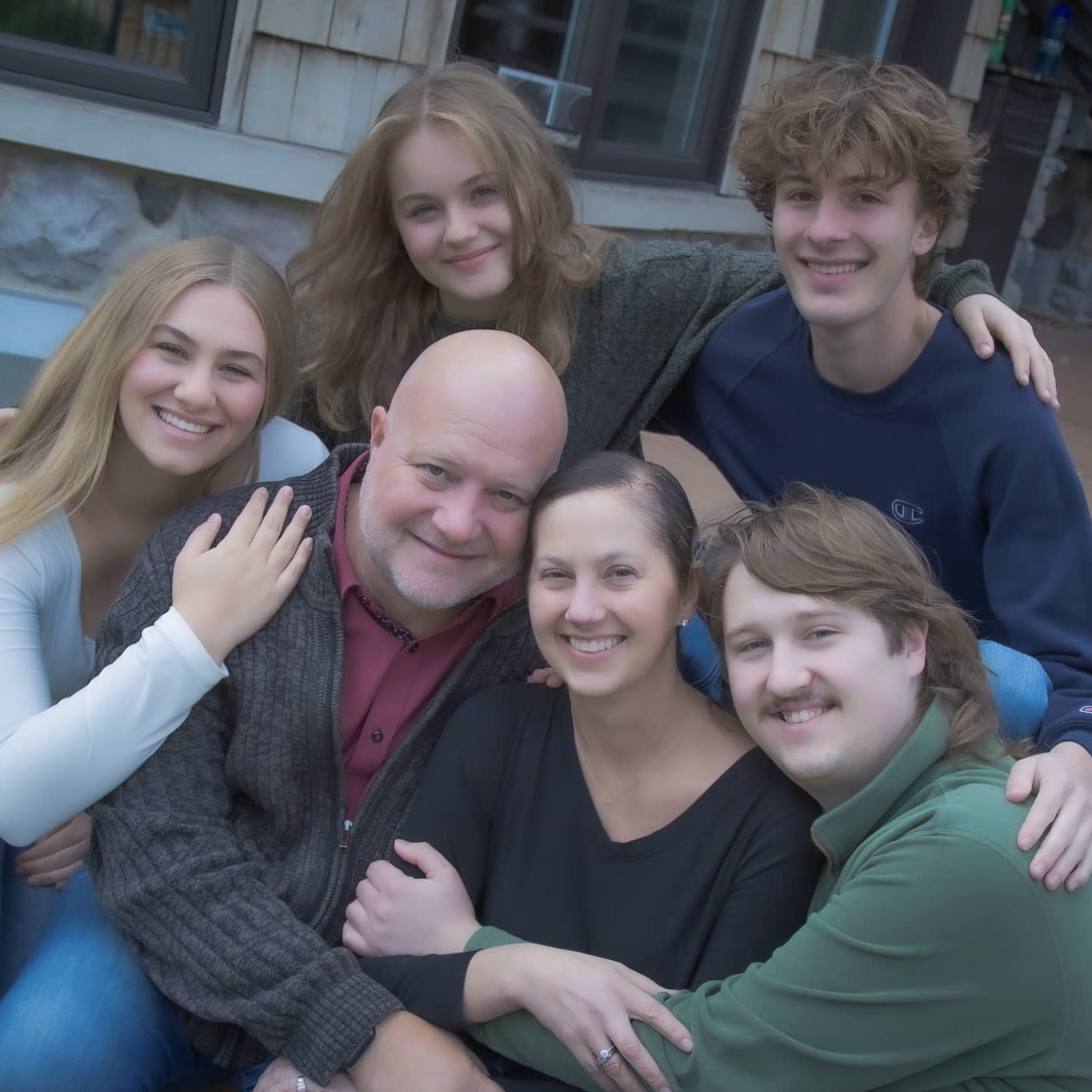 Photo of Chantelle Harder, owner of Plato's Closet St. James, and her family