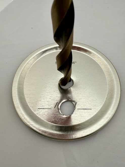 drill bit tutorial into mason jar lid for mushroom cultivation
