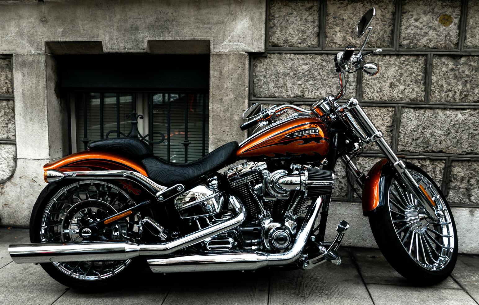 black and orange cruiser bike