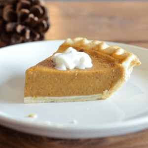 Classic Pumpkin Pie with a Dollop of Cream