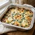 Baked Spinach & Artichoke Dip in its foil pan