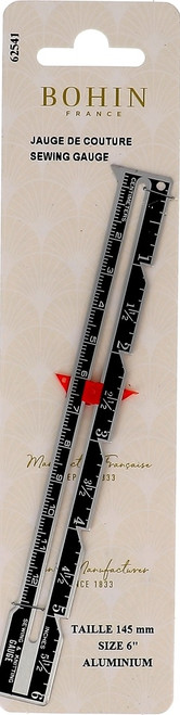 Very useful sewing gauge with a double pointed slide making it ideal for checking the width of your seam when sewing, making alterations or hemming.

Also a handy tool for measuring and marking your work.

Package contains 1x 14.5cm Aluminium gauge.
