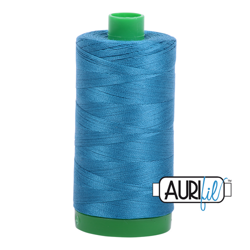 Aurifil 40wt Thread - 1000m

The 1000m spools are perfect for that medium to large project when you are worried about running out of thread. 

The 40wt range is the favourite choice for machine quilting and embroidery. The slightly heavier thread emphasizes the quilting stitches and will show up more in your work.

This is a high quality 100% Cotton thread, making it ideal for all forms machine work whether it is on Applique, for Quilting, Machine Piecing or Long-arm Quilting.

If you prefer to do things by hand, this is ideal for Cross stitching, Hand Piecing and work with Lace.