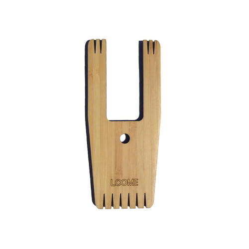 This 5-in-1, patented tool can make pom poms, tassels, friendship bracelets, cords and small weavings. If you're an avid weaver, this is the model we recommend!

This tool can make .5" to 2.25" (1.3 to 5.7 cm) size pom poms and tassels depending on how much yarn you wind onto the tool and how much you trim down.

Stunningly simple and incredibly versatile. The perfect must-have fiber craft and DIY tool for all everyone. 

Which Loome tool model should you get?: Go here for a comparison chart.