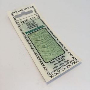 5 m (5.5 yds) Art. 018
100 % pure silk 4-strand embroidery floss

Silk is the queen of all natural fibres and adds a lovely soft and luxurious lustre to your stitching.  Try Silk instead of using cotton floss and see dreams come true with the most valuable hand embroidery thread.

Silk is available in a practical non-polluting 5 m spiral pack which keeps the valuable silk thread clean and tangle free.