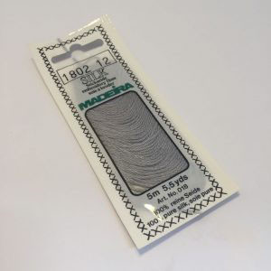 5 m (5.5 yds) Art. 018
100 % pure silk 4-strand embroidery floss

Silk is the queen of all natural fibres and adds a lovely soft and luxurious lustre to your stitching.  Try Silk instead of using cotton floss and see dreams come true with the most valuable hand embroidery thread.

Silk is available in a practical non-polluting 5 m spiral pack which keeps the valuable silk thread clean and tangle free.