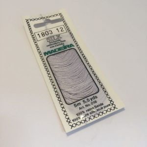 5 m (5.5 yds) Art. 018
100 % pure silk 4-strand embroidery floss

Silk is the queen of all natural fibres and adds a lovely soft and luxurious lustre to your stitching.  Try Silk instead of using cotton floss and see dreams come true with the most valuable hand embroidery thread.

Silk is available in a practical non-polluting 5 m spiral pack which keeps the valuable silk thread clean and tangle free.