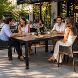 Paris 4 Leg Table Base - Rectangle 6 Seater Black in an outdoor restaurant or cafe environment