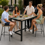 Extrema Driftwood - Black Mid Height Table in a modern outdoor patio at a bistro or hotel lounge