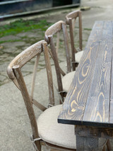 Rustic trestle table with rustic cross back chairs