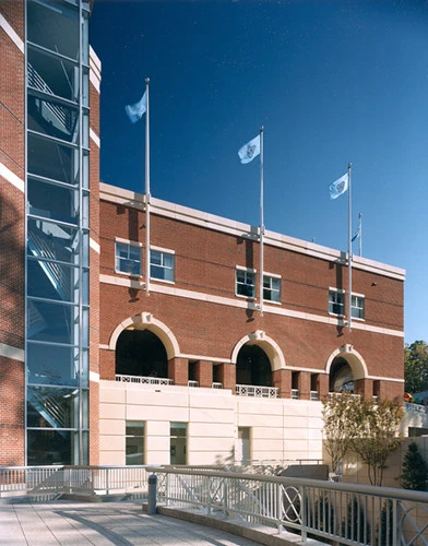 Concord American vertical wall mount flagpole installed on a building