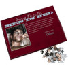 Back of a puzzle box with pieces scattered.