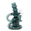Flying Pig 5-inch teal mini recycler dab rig water pipe with showerhead percolator, thick borosilicate glass, removable 14mm male herb bowl, and compatibility with a 14mm male quartz banger side view.