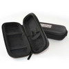 Tan eGo vape pen case opened with a black case behind it.
