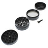 Black metal rasta leaf grinder apart.