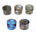 Assorted metal grinders with skull graphics.