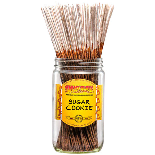100 Sugar Cookie-scented Wild Berry Traditional Incense Sticks in a labeled jar with their signature white-colored glitter sticks emerging at the top.