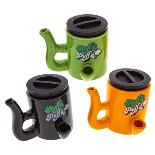 Stuff It Puff It Stash Pipes available in Black, Green, and Orange.