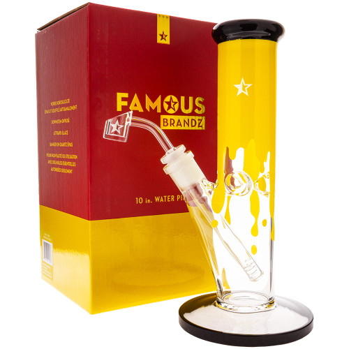 Famous Glass Surrender 10" Dab Rig next to its collectible display box.